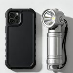 Durable affordable tech accessories for budget shoppers, sturdy phone cables and compact portable outdoor lighting laid on neutral minimalist background