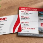 AARP membership card with discount coupons on a clean wooden table, soft natural light